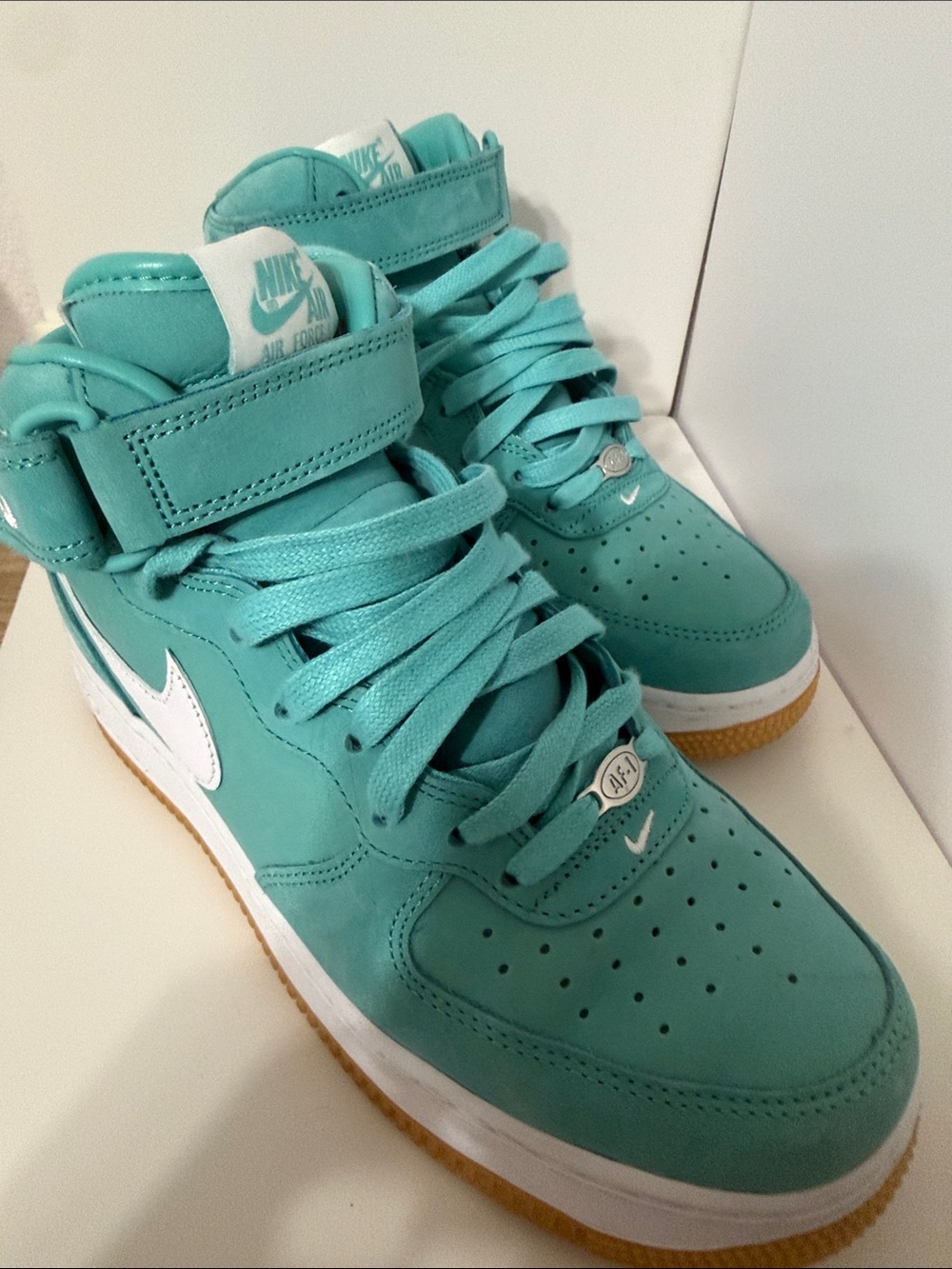 Nike Teal High-Top Sneakers with White Swoosh